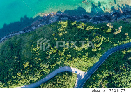 Aerial view top view seashore with asphalt road curve in Tropical island Amazing nature view Beautiful island in Phuket Thailand 75014774