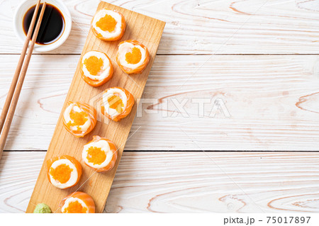 fresh salmon sushi roll with mayonnaise and shrimp egg fresh salmon sushi roll with mayonnaise and shrimp egg 75017897