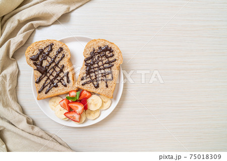 whole wheat bread with fresh banana, strawberry and chocolate whole wheat bread with fresh banana, strawberry and chocolate 75018309