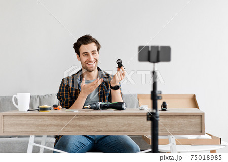 Construction, renovation blog and assembling furniture, popular blogger works with webcam 75018985