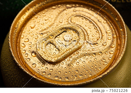 Cold metal beer can with water drops. Alcoholic drink. Canned drinks. Cold metal beer can with water drops. Alcoholic drink. Canned drinks. 75021226