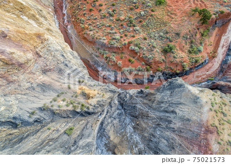 rock formation and creek - aerial view rock formation and creek - aerial view 75021573