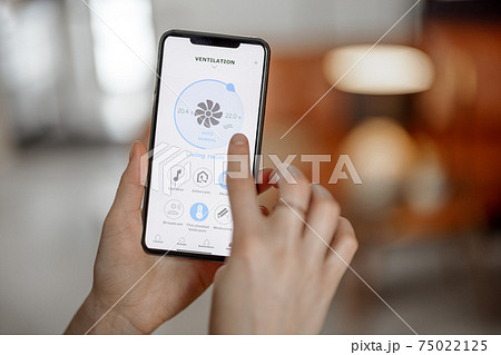 Smartphone with launched application for ventilation adjustment Smartphone with launched application for ventilation adjustment 75022125