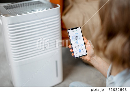 Smartphone with launched application for ventilation adjustment Smartphone with launched application for ventilation adjustment 75022648