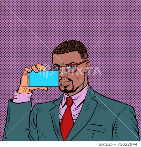 An African businessman is streaming on a smartphone An African businessman is streaming on a smartphone 75022944