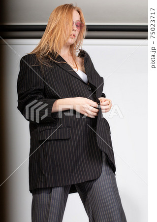 White european young woman in studio White european young woman in studio 75023717