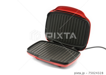 Electric grill for home use on a white background Electric grill for home use on a white background 75024328
