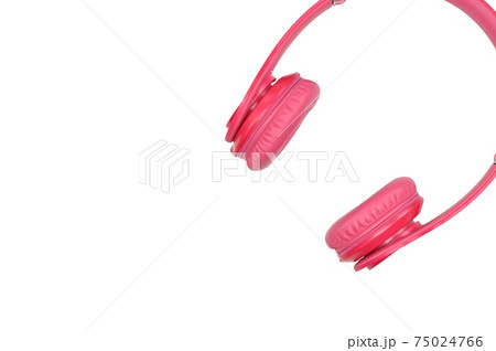 Pink headphones for listening to sound and music on a white background Pink headphones for listening to sound and music on a white background 75024766