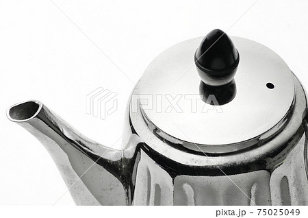 Vintage silver teapot on a white background Vintage silver teapot on a white background 75025049