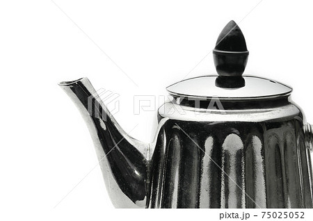 Vintage silver teapot on a white background Vintage silver teapot on a white background 75025052