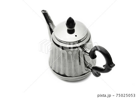 Vintage silver teapot on a white background Vintage silver teapot on a white background 75025053