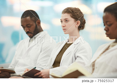 Portrait of Female Medical Student in Seminar Portrait of Female Medical Student in Seminar 75025317