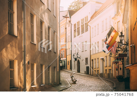 Tallinn, Estonia. Empty Puhavaimu Street In Old Town During Sunset. Motorcycle Parked On Old Street 75041768