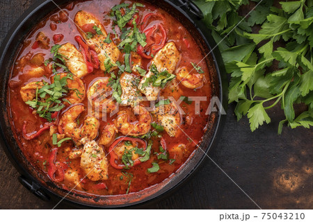 Creole cajun court bouillon with fish and seafood gumbo chowder stew Creole cajun court bouillon with fish and seafood gumbo chowder stew 75043210
