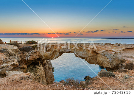 Famous stone Sin Bridge at sunrise in Ayia Napa Cyprus 75045319