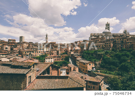 Panoramic view of Siena city with historic buildings and street Panoramic view of Siena city with historic buildings and street 75046734