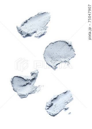 Smears of cosmetic clay on a white background. Smears of cosmetic clay on a white background. 75047907