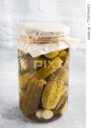 Preservation of vegetables in banks. Fermentation products. Harvesting cucumbers for the winter. Copy space. 75050483