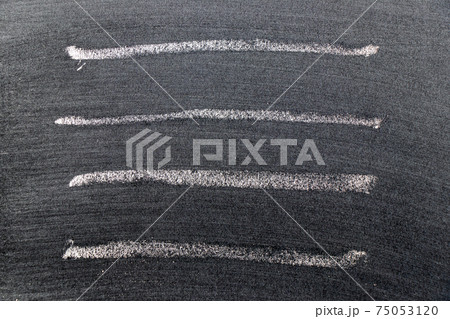White color chalk hand drawing in set of line shape on black board background White color chalk hand drawing in set of line shape on black board background 75053120