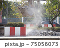 Excavator digging   a road. Construction concept. 75056073