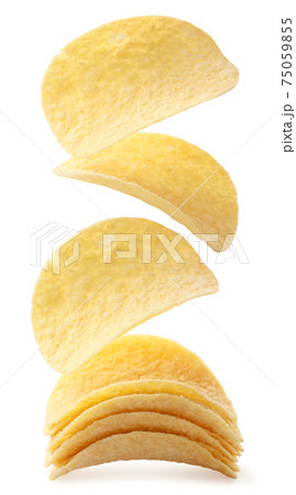 Potato chips are falling on a heap on a white background. Isolated 75059855
