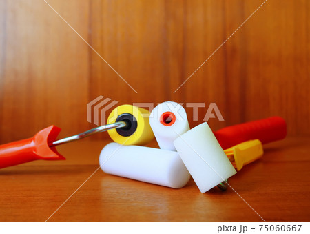 Home repair tools. Rollers for wall coloring close up. Home repair tools. Rollers for wall coloring close up. 75060667