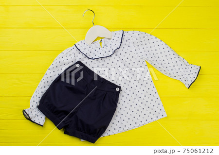 Blouse and shirt on yellow 75061212