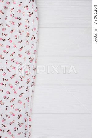 Floral print on white fabric Floral print on white fabric 75061268