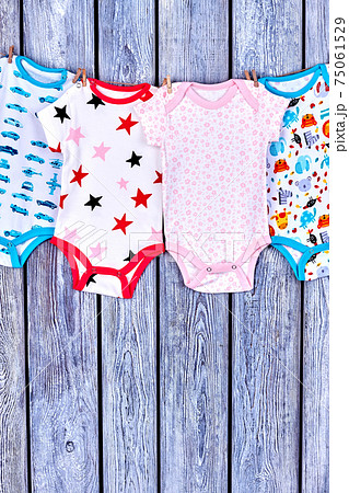 Kids washed clothes on rope. Kids washed clothes on rope. 75061529
