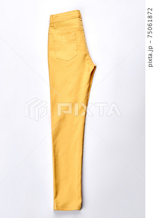 Female new folded yellow trousers. 75061872