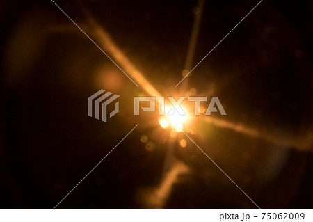 Abstract Natural Sun flare on the black Abstract Natural Sun flare on the black 75062009
