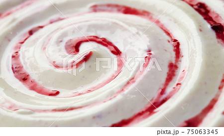 Yogurt with fruit jam, curd cream swirl with berry topping Yogurt with fruit jam, curd cream swirl with berry topping 75063345
