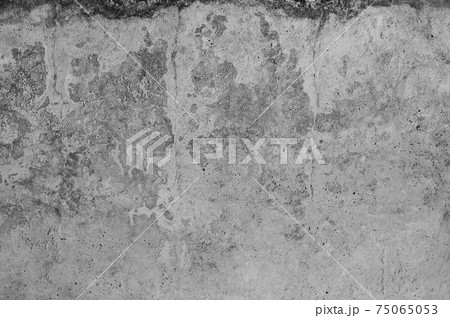 Gray concrete wall, old surface with peeling plaster Gray concrete wall, old surface with peeling plaster 75065053