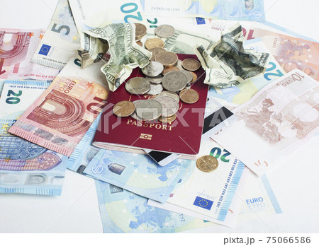Cash on table isolated: dollars, euro, rubl broken money. All in mess, global crisis . passport travel concept 75066586