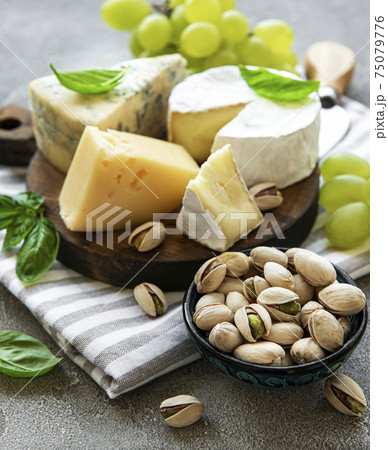 Various types of cheese and snacks Various types of cheese and snacks 75079776