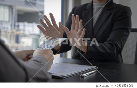 Businessmen refuse to accept money bribery or fraud or cheat, Combating Illegal Receiving of Money and Social Injustice, Anti bribery and corruption concept. Businessmen refuse to accept money bribery or fraud or cheat, Combating Illegal Receiving of Money and Social Injustice, Anti bribery and corruption concept. 75080359