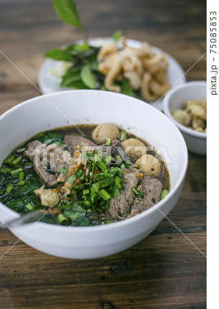 Noodles with pork and pork balls with soup Thai style 75085853
