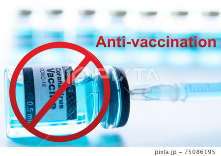 Stop vaccinations. Anti Covid vaccine isolated on white. Red forbidden sign with Medical syringe, needle for protection flu virus and coronavirus. Concept: diseases, medical care, science. Stop vaccinations. Anti Covid vaccine isolated on white. Red forbidden sign with Medical syringe, needle for protection flu virus and coronavirus. Concept: diseases, medical care, science. 75086195