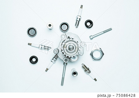 Accessories for cars. Set of new metal car part. Auto motor mechanic spare or automotive piece isolated on white background. Automobile engine service with space for text. 75086428
