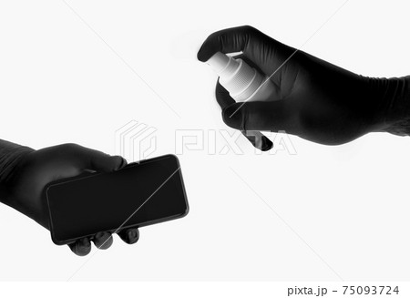 hands in black gloves spray spray disinfect the phone hands in black gloves spray spray disinfect the phone 75093724