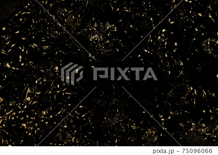 Gold distressed grunge texture. Patina scratch golden background. 75096066