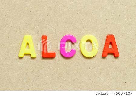 Color alphabet letter with word ALCOA (Abbreviation of Attributable, Legible, Contemporaneous, Original and Accurate) on wood background 75097107