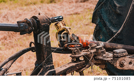 Tractor and cardan shaft for coupling equipment, tractor in the field during haymaking. Tractor and cardan shaft for coupling equipment, tractor in the field during haymaking. 75101085