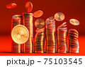 Cryptocurrency Bitcoin golden coins spilling on the table. 75103545