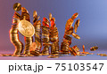 Cryptocurrency Bitcoin golden coins spilling on the table. 75103547
