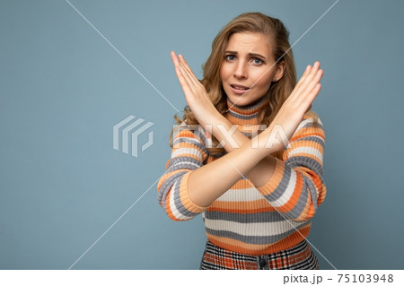 Portrait of young pretty beautiful sad angry dissatisfied blonde woman with sincere emotions wearing 75103948