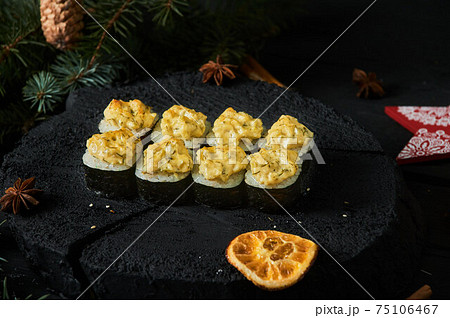 Asian food delivery home, various sushi sets in plastic containers with sauces, rice and chopsticks. Top view, flat lay. 75106467