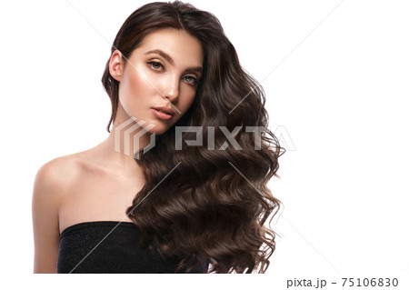 Beautiful brown-haired girl with a perfectly curls hair, and classic make-up. Beauty face and hair. Beautiful brown-haired girl with a perfectly curls hair, and classic make-up. Beauty face and hair. 75106830