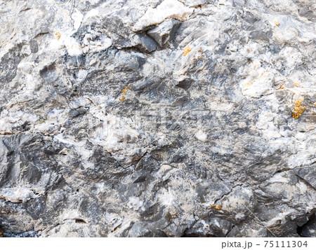Close up natural rock texture 75111304
