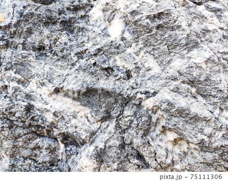 Close up natural rock texture 75111306